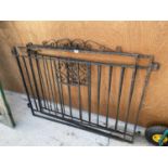 A PAIR OF DECORATIVE WROUGHT IRON GARDEN GATES (L:119CM EACH)