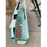 A BOSCH ELECTRIC HEDGE TRIMMER