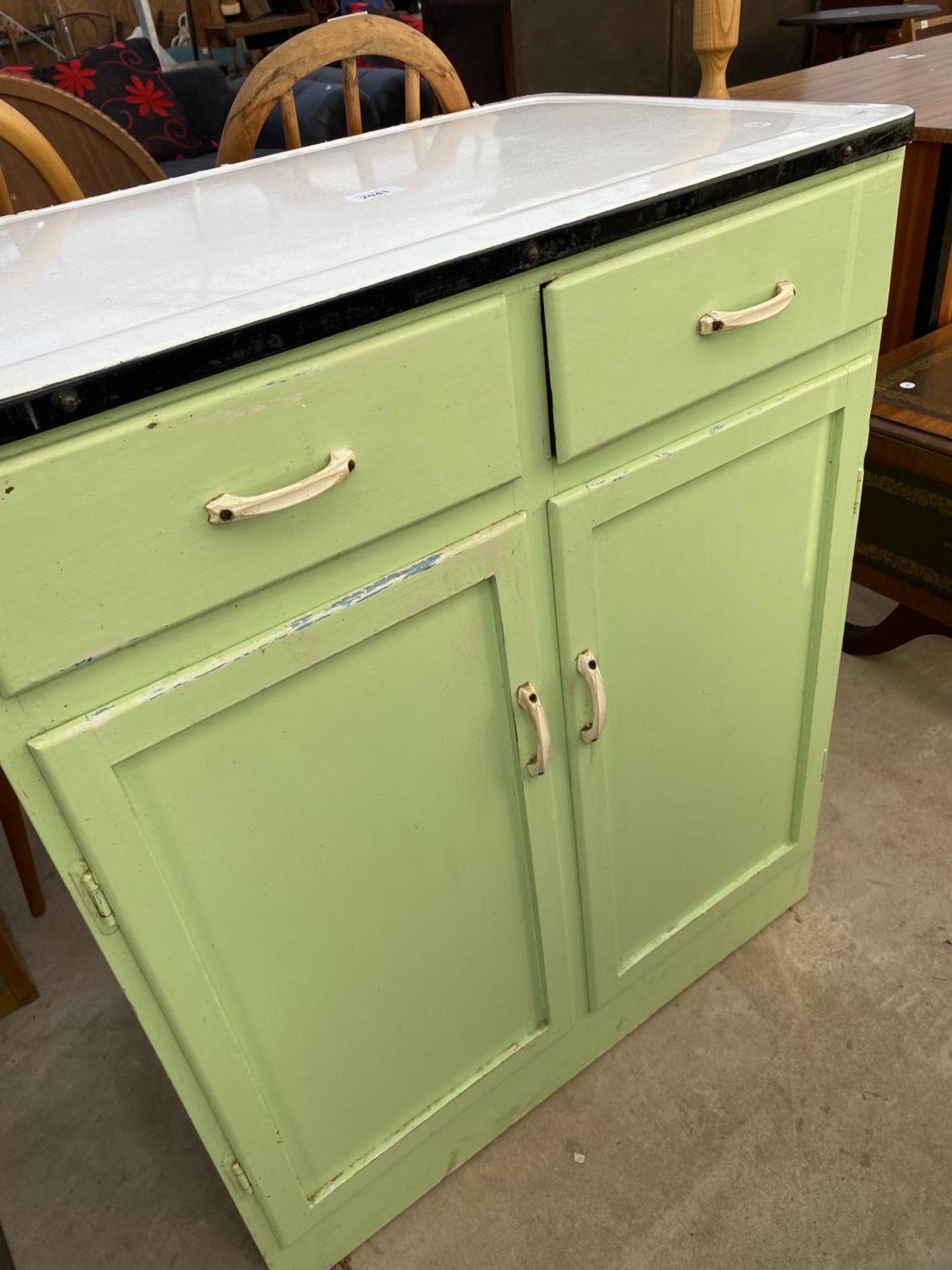 A 1950'S VIVID GREEN KITCHEN UNIT WITH BLACK AND WHITE ENAMEL TOP, 30" WIDE - Image 2 of 3