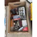 AN ASSORTMENT OF VINTAGE AUTOMOBILE SPARES TO INCLUDE LIGHTS ETC