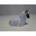 A ROYAL CROWN DERBY PAPERWEIGHT LAMB WITH A GOLD STOPPER