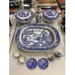 A QUANTITY OF BLUE AND WHITE POTTERY TO INCLUDE A LARGE MEAT PLATTER, LIDDED TUREENS, ETC. SOME A/F