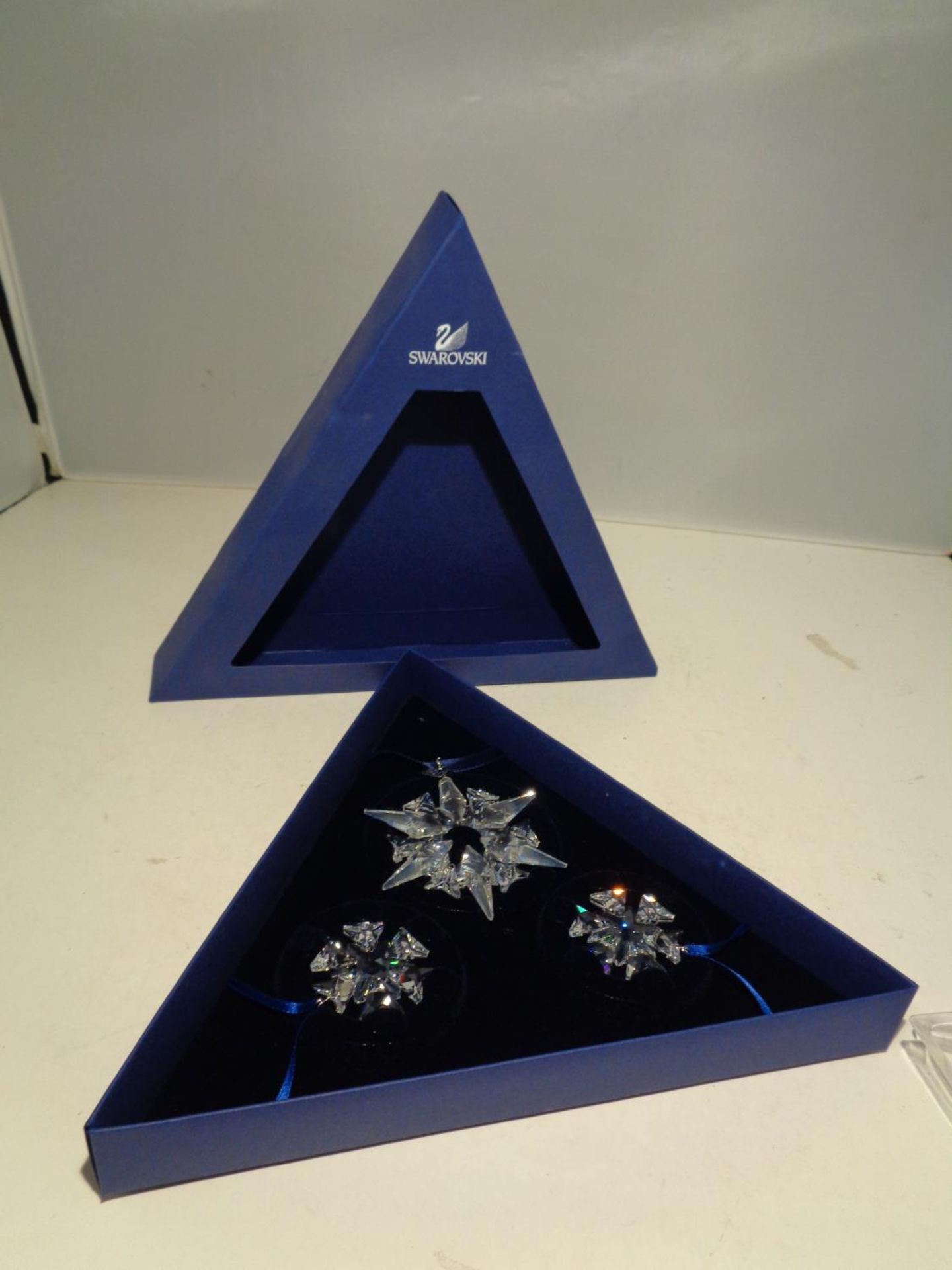 A SWAROVSKI CRYSTAL ANNUAL EDITION CHRISTMAS ORNAMENT SET OF THREE '2007'