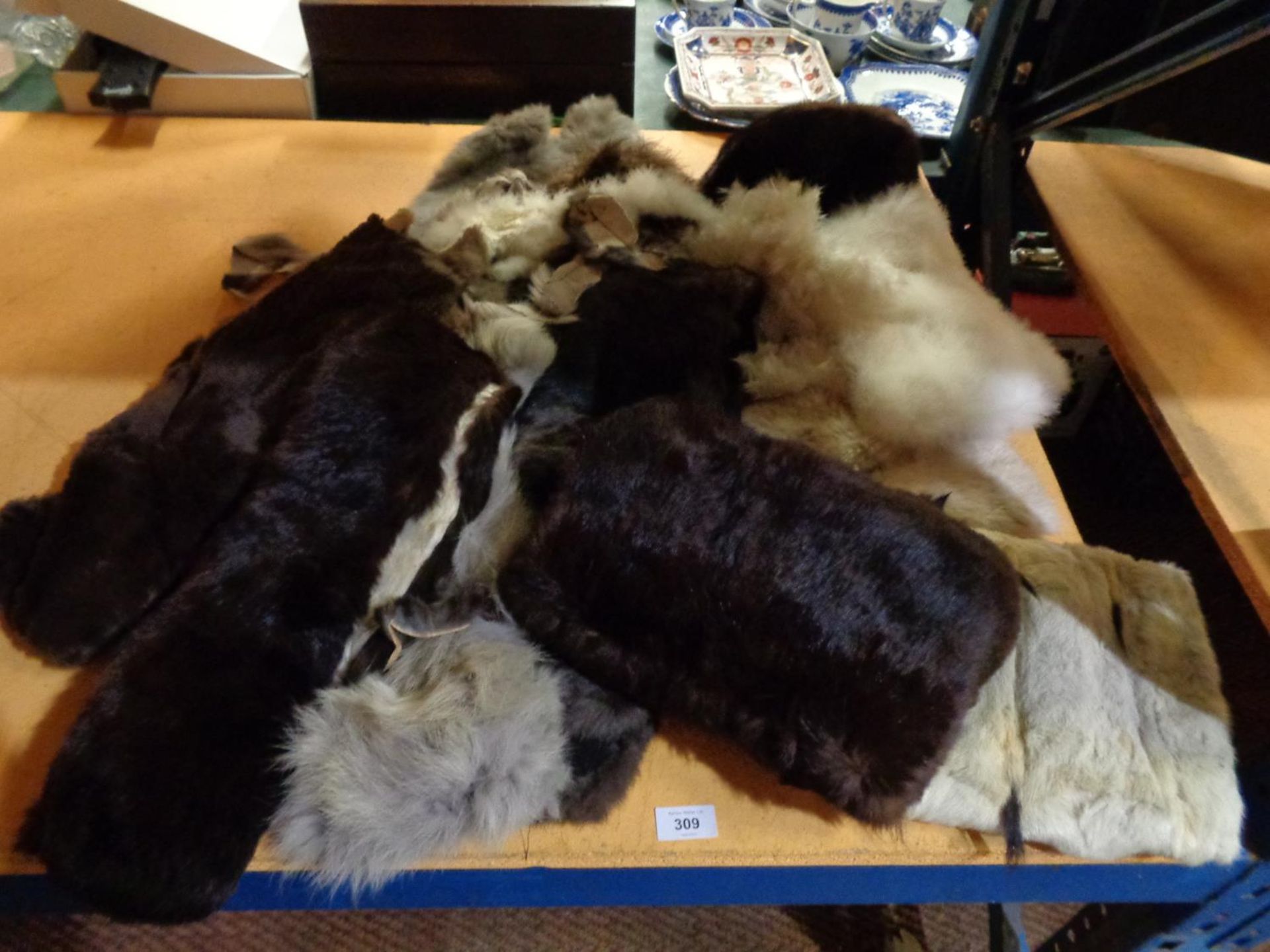 A NUMBER OF FUR ITEMS TO INCLUDE TWO HAND MUFFS