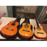 THREE ACCOUSTIC GUITARS, TWO FULL SIZE AND ONE CHILD'S