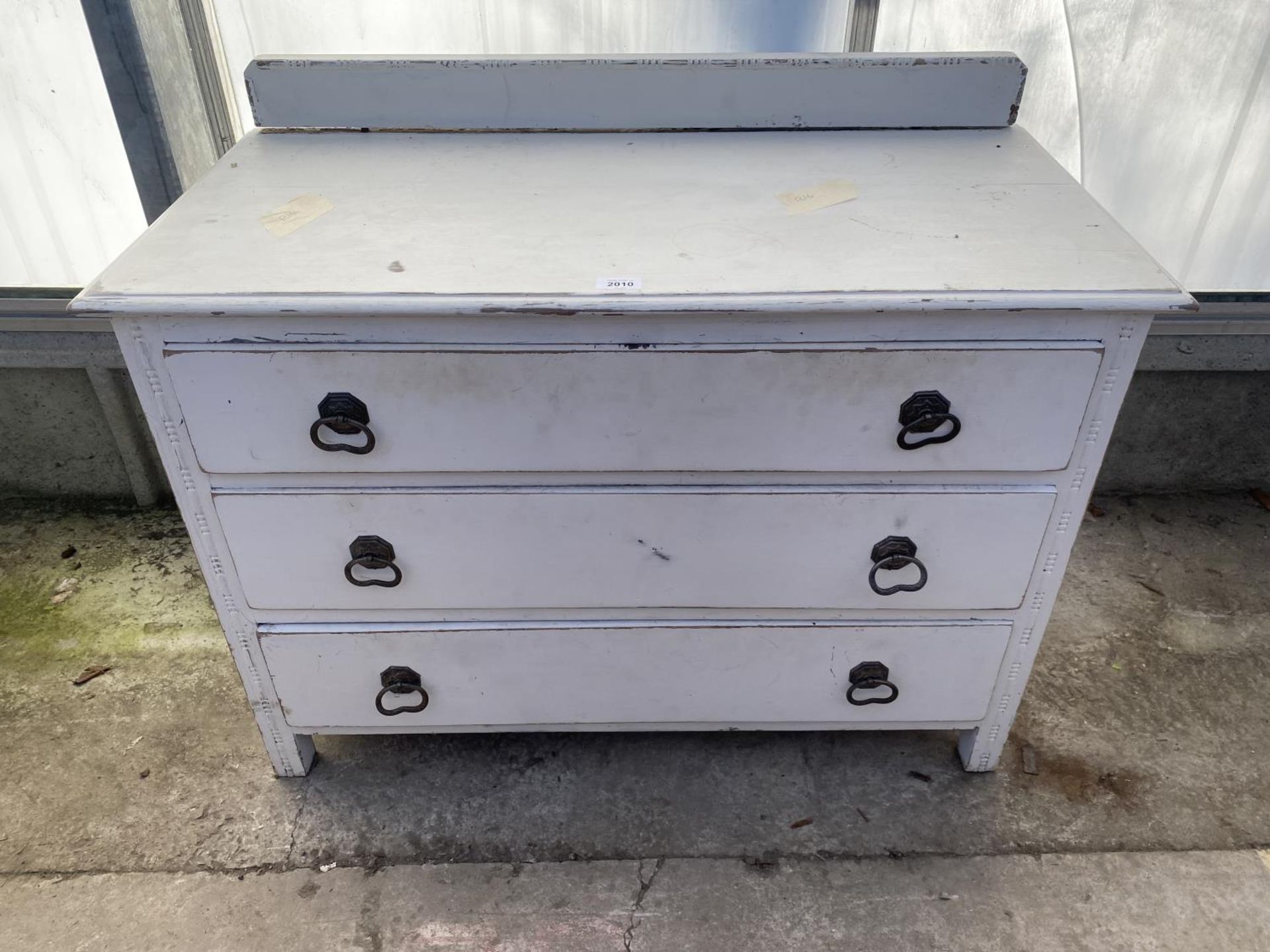 A WHITE PAINTED THREE DRAWER CHEST, 36" WIDE