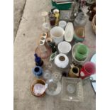 A LARGE ASSORTMENT OF CERAMIC AND GLASS WARE TO INCLUDE VASES, PLANTERS AND JUGS ETC