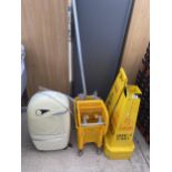 AN ASSORTMENT OF ITEMS TO INCLUDE WET FLOOR SIGNS, A MOP AND BUCKET AND A HEATER ETC