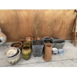 A LARGE ASSORTMENT OF GARDEN PLANTERS TO INCLUDE A NUMBER OF TERRACOTTA EXAMPLES
