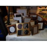 A NUMBER OF SMALL PHOTO FRAMES IN MIXED DESIGNS FROM SINGLE APERTURE TO MULTIPLE APERTURE