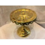 A VICTORIAN BRASS TRIVET HEIGHT 23CM