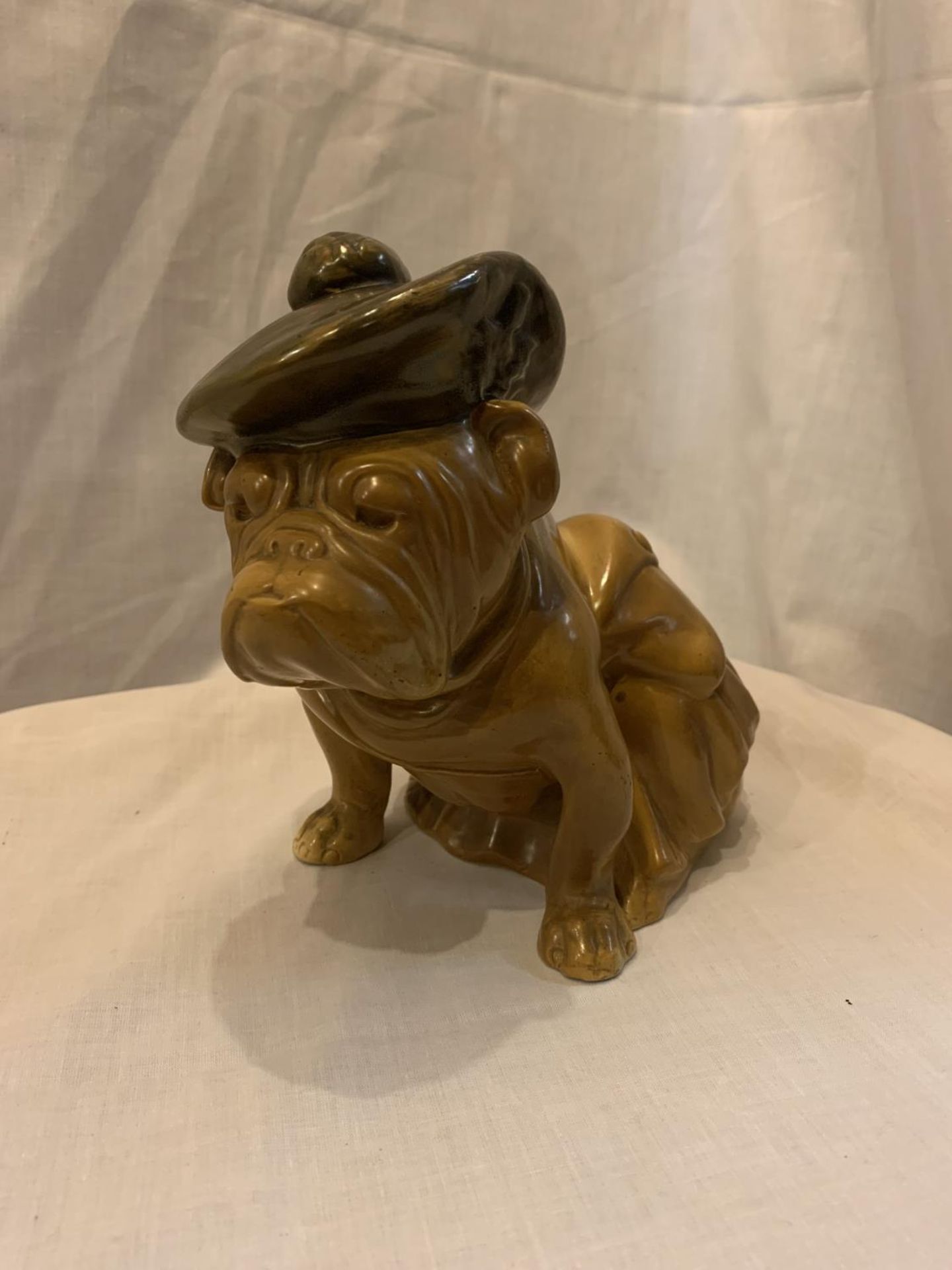 A ROYAL DOULTON TITANIAN MODEL OF A BULLDOG, CIRCA 1930.A MOTTLED GREEN AND BROWN GLAZED BULLDOG