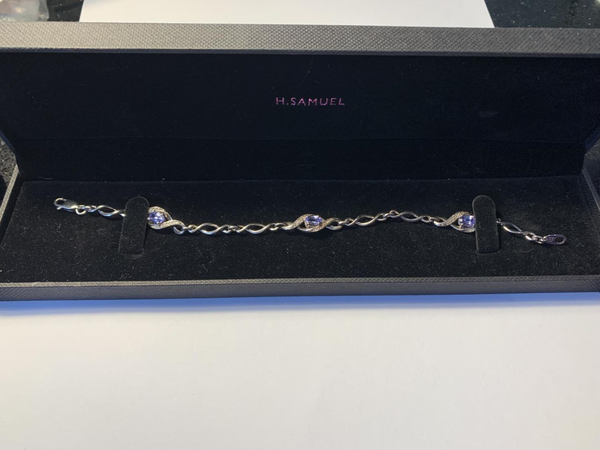 A SILVER BRACELET WITH POSSIBLY AQUAMARINES AND DIAMOND CHIPS IN A PRESENTATION BOX - Image 4 of 4