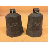 A PAIR OF BRASS DECORATED COW BELLS, HEIGHT 14CM