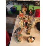 SEVEN CERAMIC FIGURES OF CLOWNS AND TWO BIRDS