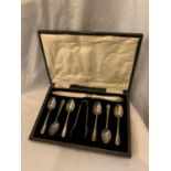 A SILVER PLATED SET COMPRISING OF SIX TEASPOONS, SUGAR TONGS AND A CAKE KNIFE