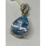 A 9 CARAT GOLD SKY BLUE AND WHITE TOPAZ PENDANT GROSS WEIGHT 7 GRAMS APPROXIMATE GOLD WEIGHT 3.3