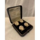 A BOXED SET OF FOUR HALLMARKED CHESTER SILVER NAME PLACE HOLDERS