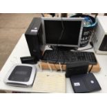AN ASSORTMENT OF ITEMS TO INCLUDE A MONITOR, A DELL TOWER AND A KEYBOARD ETC