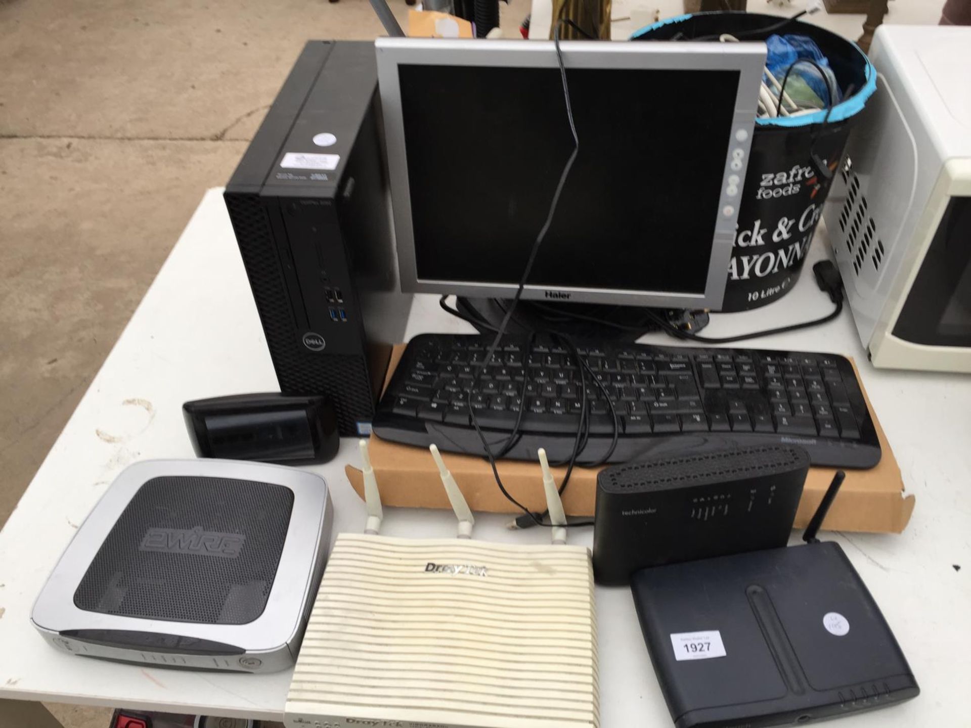 AN ASSORTMENT OF ITEMS TO INCLUDE A MONITOR, A DELL TOWER AND A KEYBOARD ETC