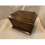 A VINTAGE MAHOGANY TEA CADDY WITH INTERIOR HINGED LIDDED BOXES MADE WITH SMALL DOVETAIL JOINTS (