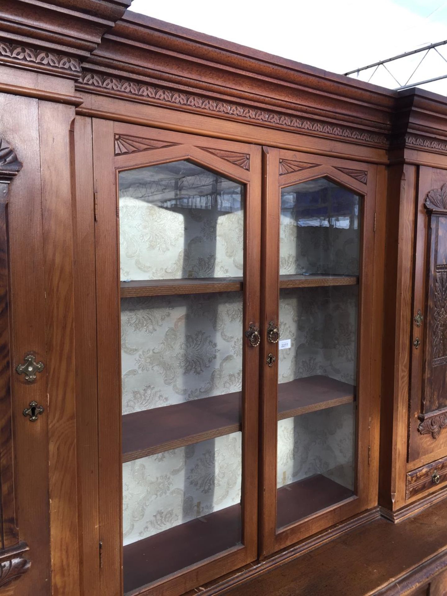 A VICTORIAN SCUMBLED PINE DRESSER, 74" WIDE, WITH INVERTED BREAKFRONT UPPER PORTION, HAVING PANELLED - Image 5 of 10