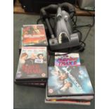 A HUNTER HOME-TEK HANDHELD HOOVER AND AN ASSORTMENT OF DVDS