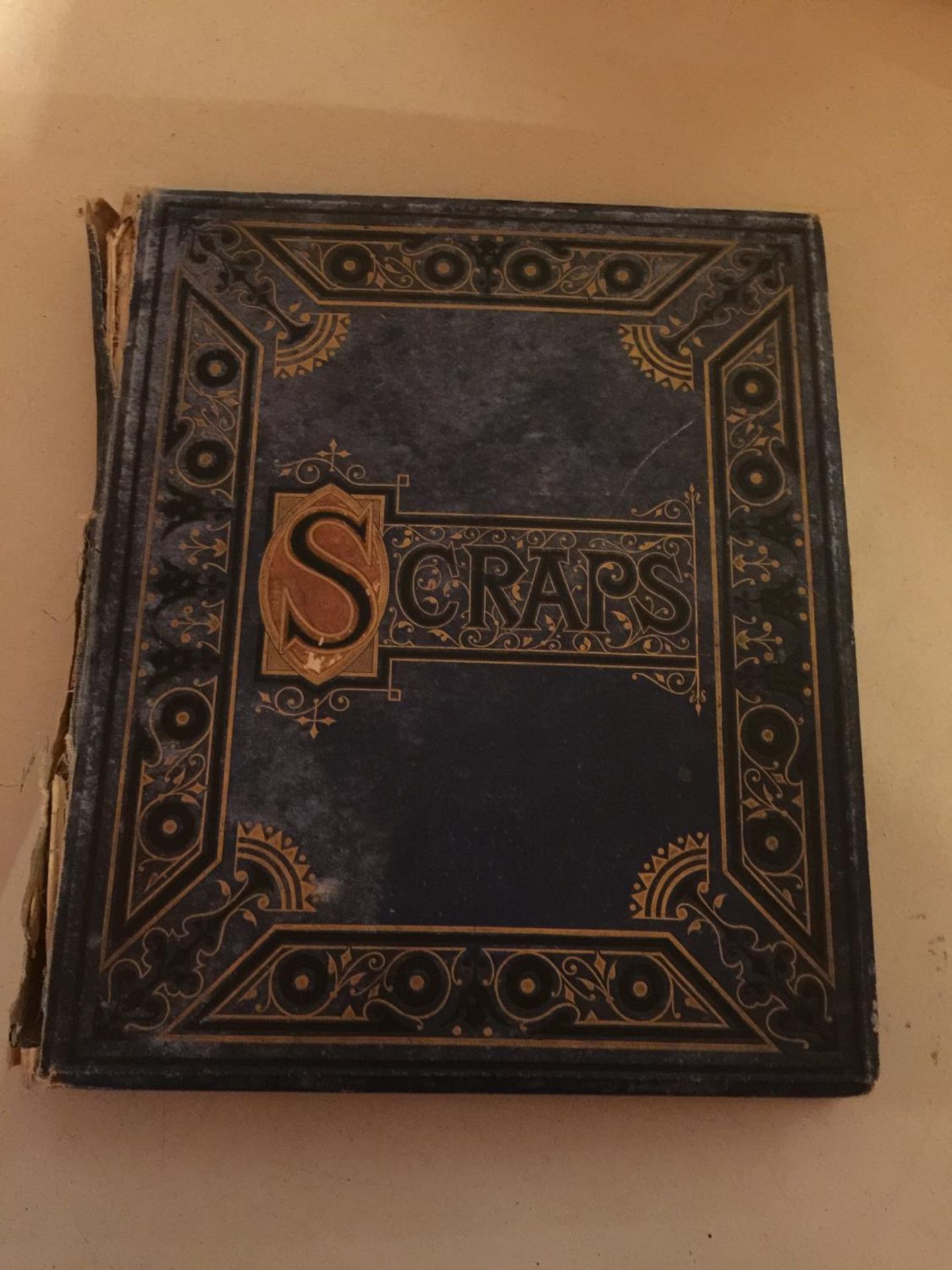 A VICTORIAN SCRAPBOOK CONTAINING CARDS AND PRESSED FLOWERS