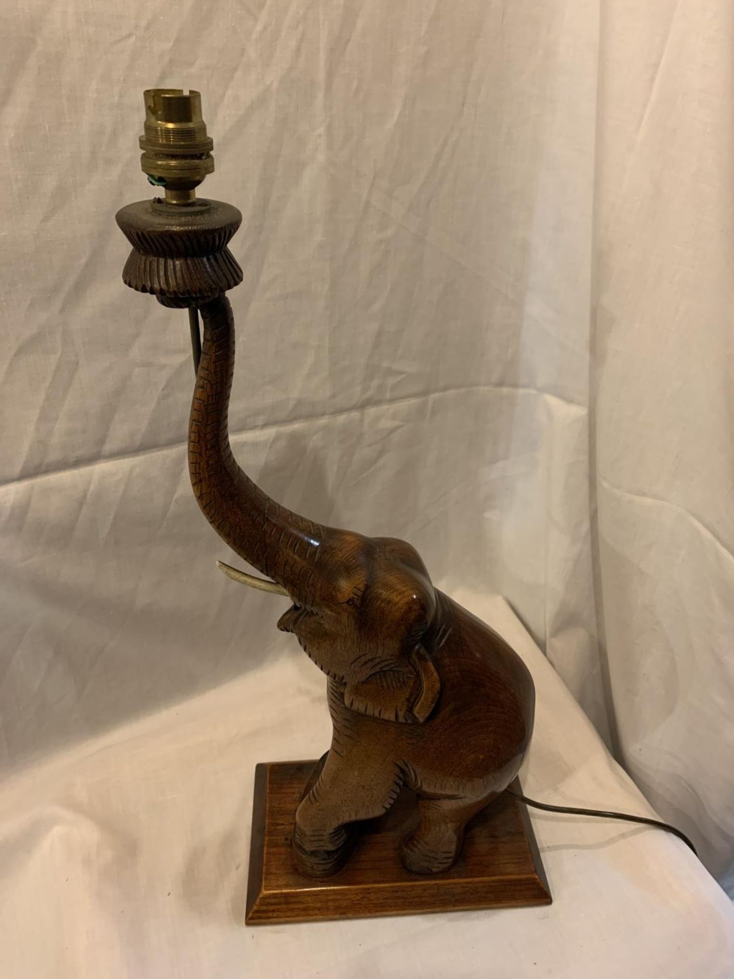 A WOODEN ELEPHANT DESIGN TABLE LAMP