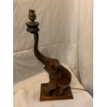 A WOODEN ELEPHANT DESIGN TABLE LAMP