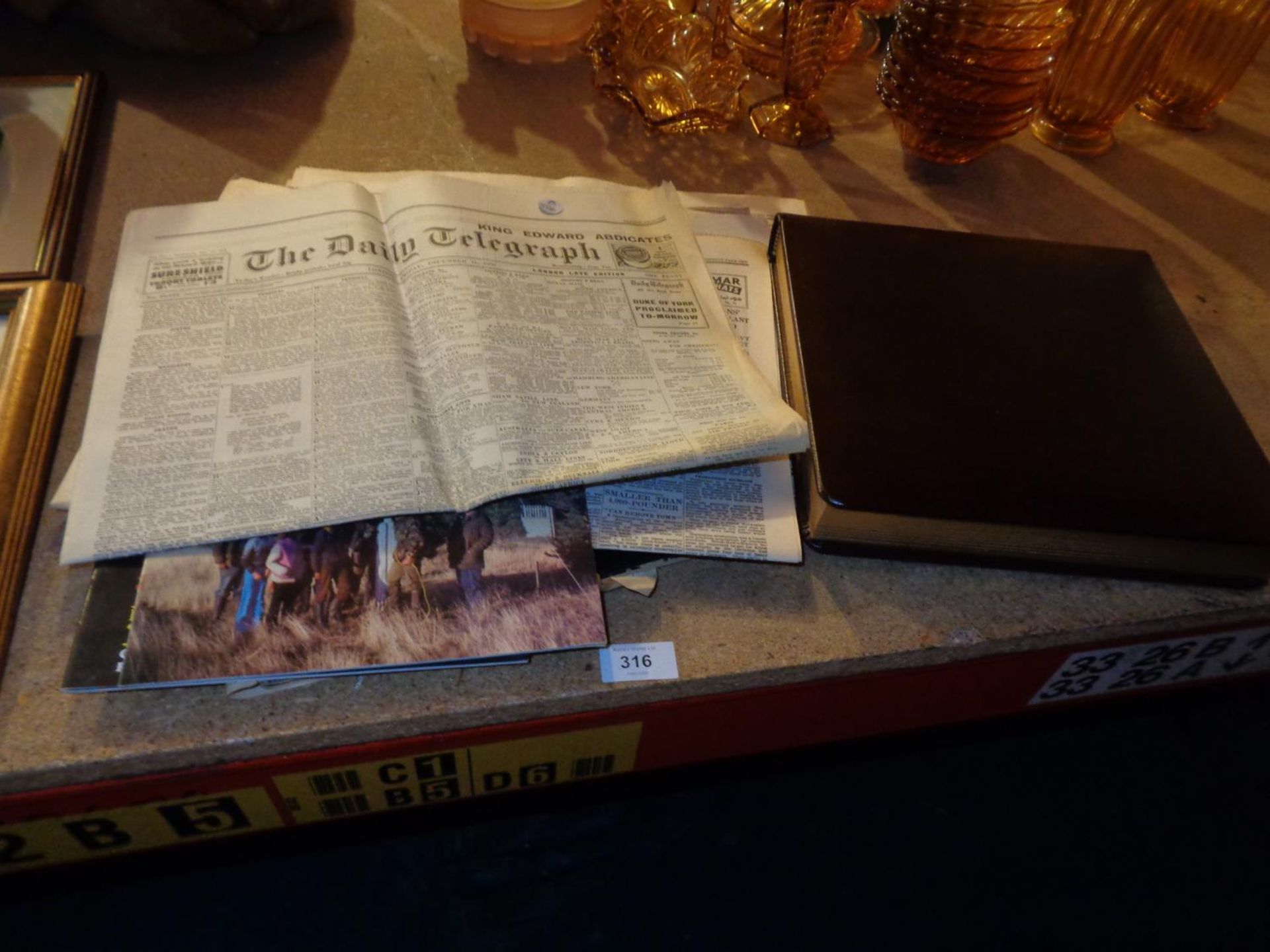 A COLLCECTION OF COPIES OF THE DAILY TELEGRAPH TO INCLUDE 1936, 1945 ETC AND A PHOTOGRAPH ALBUM