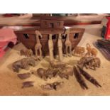 A PRIMITIVE HANDMADE TREEN NOAH'S ARK WITH ANIMALS AND FIGURES