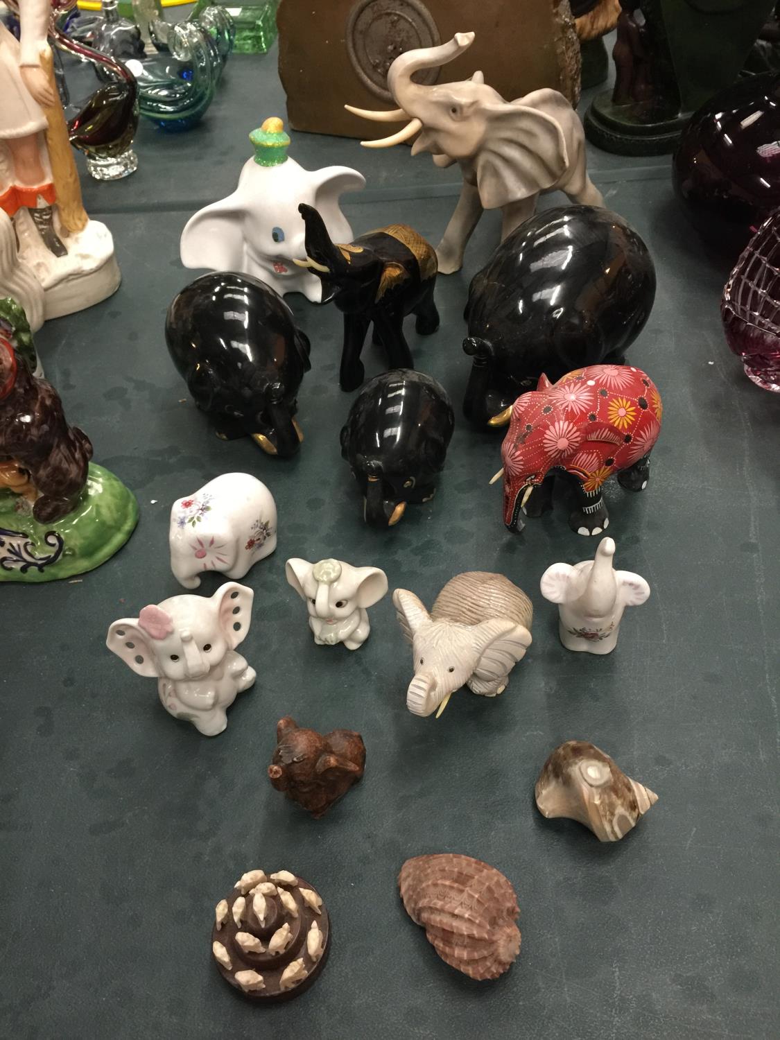 A QUANTITY OF ELEPHANTS TO INCLUDE DUMBO, BLACK AND GOLD, FLORAL DECORATED, ETC