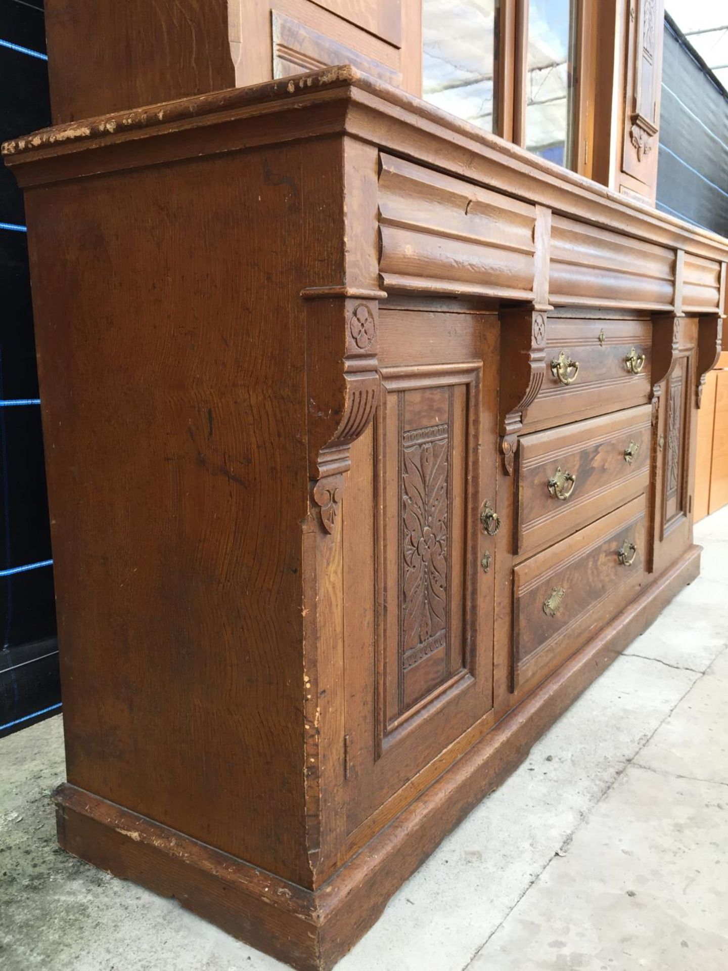 A VICTORIAN SCUMBLED PINE DRESSER, 74" WIDE, WITH INVERTED BREAKFRONT UPPER PORTION, HAVING PANELLED - Image 3 of 10