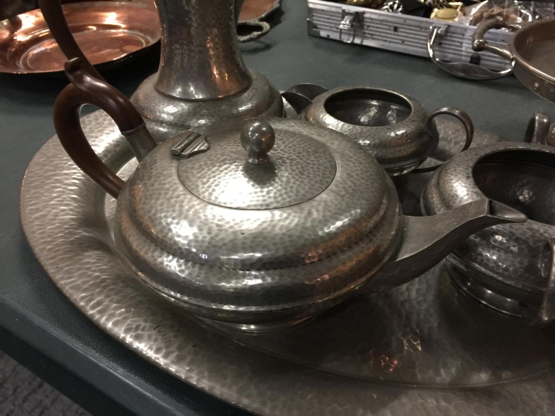 A PEWTER TEASET ON A TRAY, A PLATE ON A STAND AND THREE SMALLER PLATES - Image 3 of 6