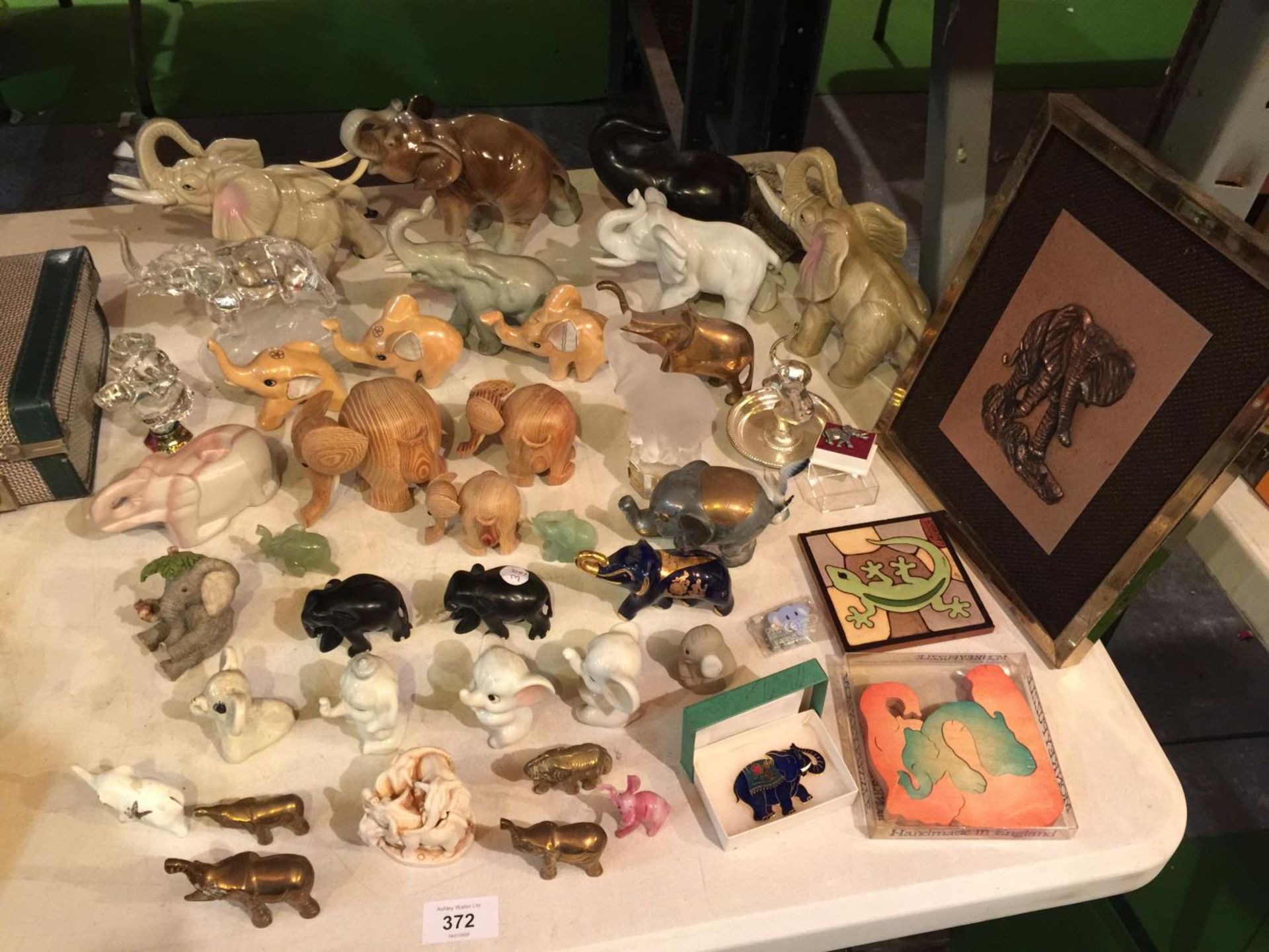 A QUANTITY OF ELEPHANTS TO INCLUDE, CERAMIC, BRASS, GLASS, ETC