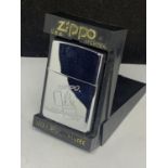 A NEW AND BOXED 'ZIPPO 25TH ANNIVERSARY 1932-1957' LIGHTER