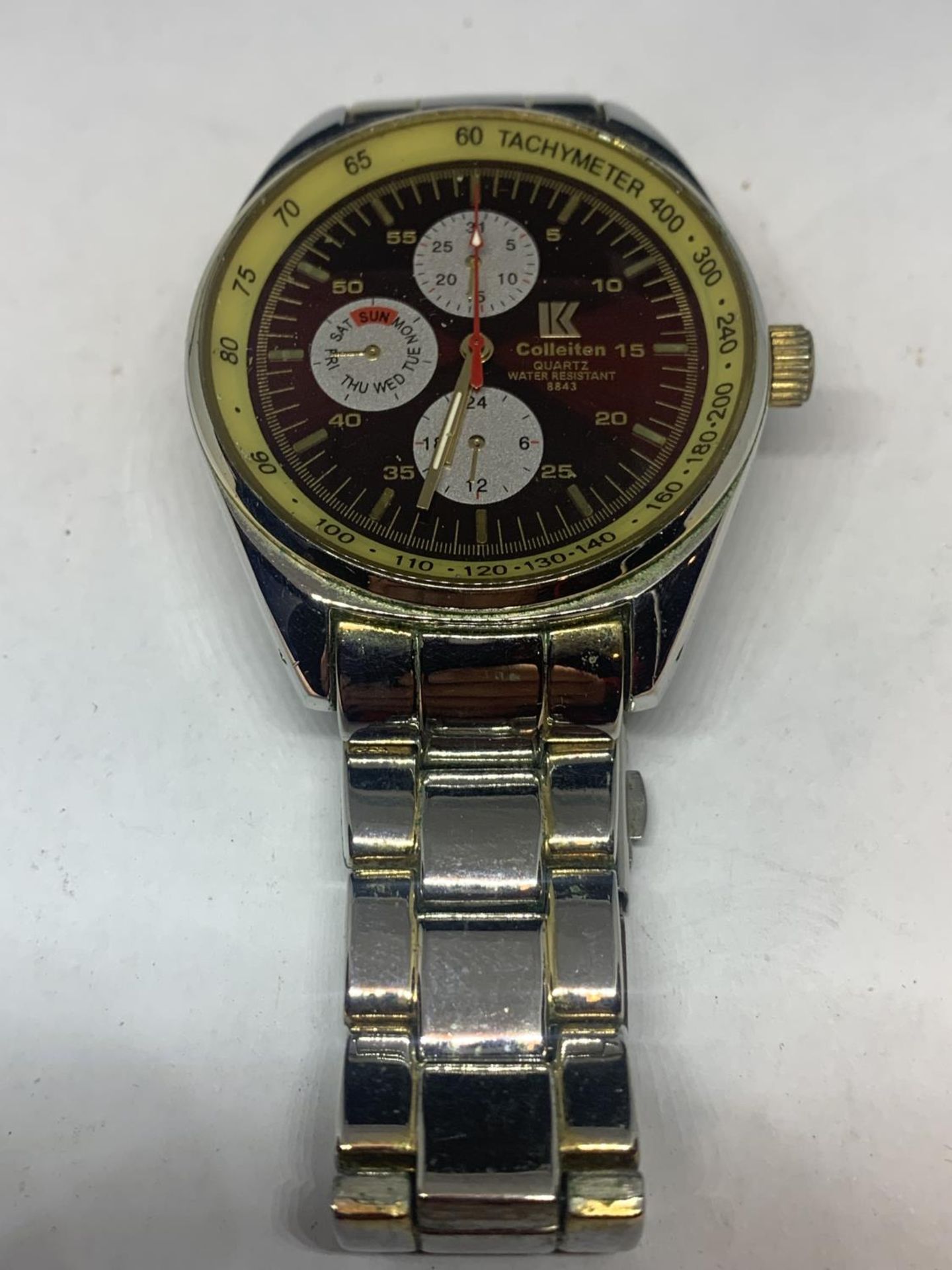 A COLLEITEN WRIST WATCH SEEN WORKING BUT NO WARRANTY