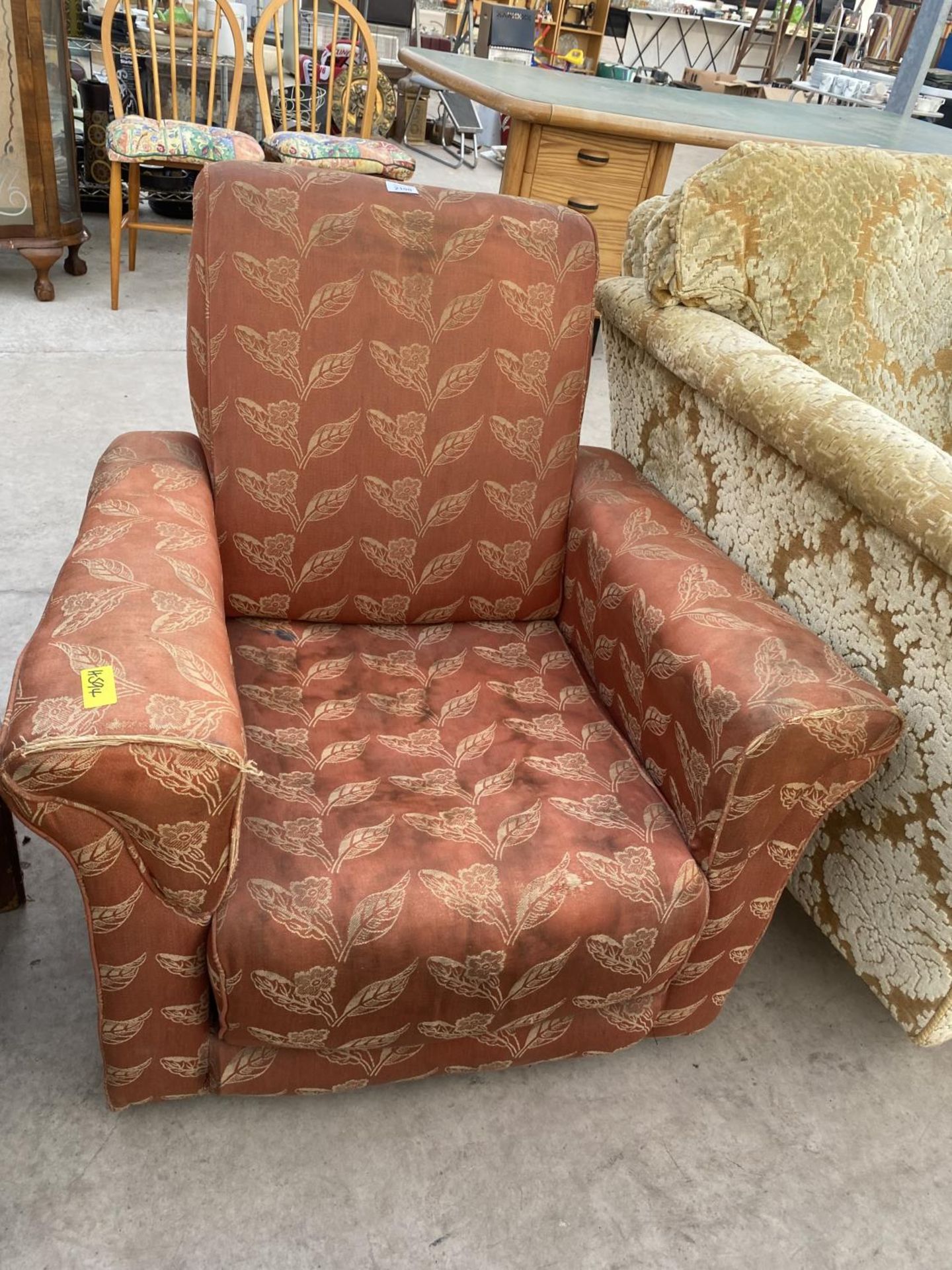 A MID 20TH CENTURY RECLINING EASY CHAIR