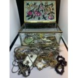 A QUANTITY OF COSTUME JEWELLERY IN A DECORATIVE GLASS BOX