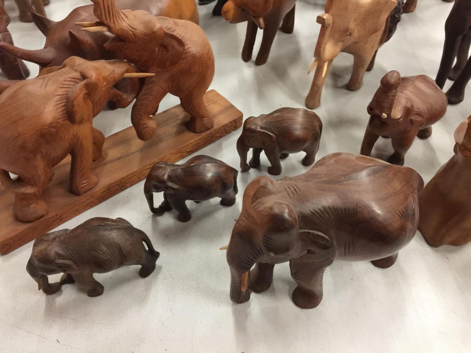 A LARGE QUANTITY OF MAINLY WOODEN ELEPHANTS - Image 2 of 10