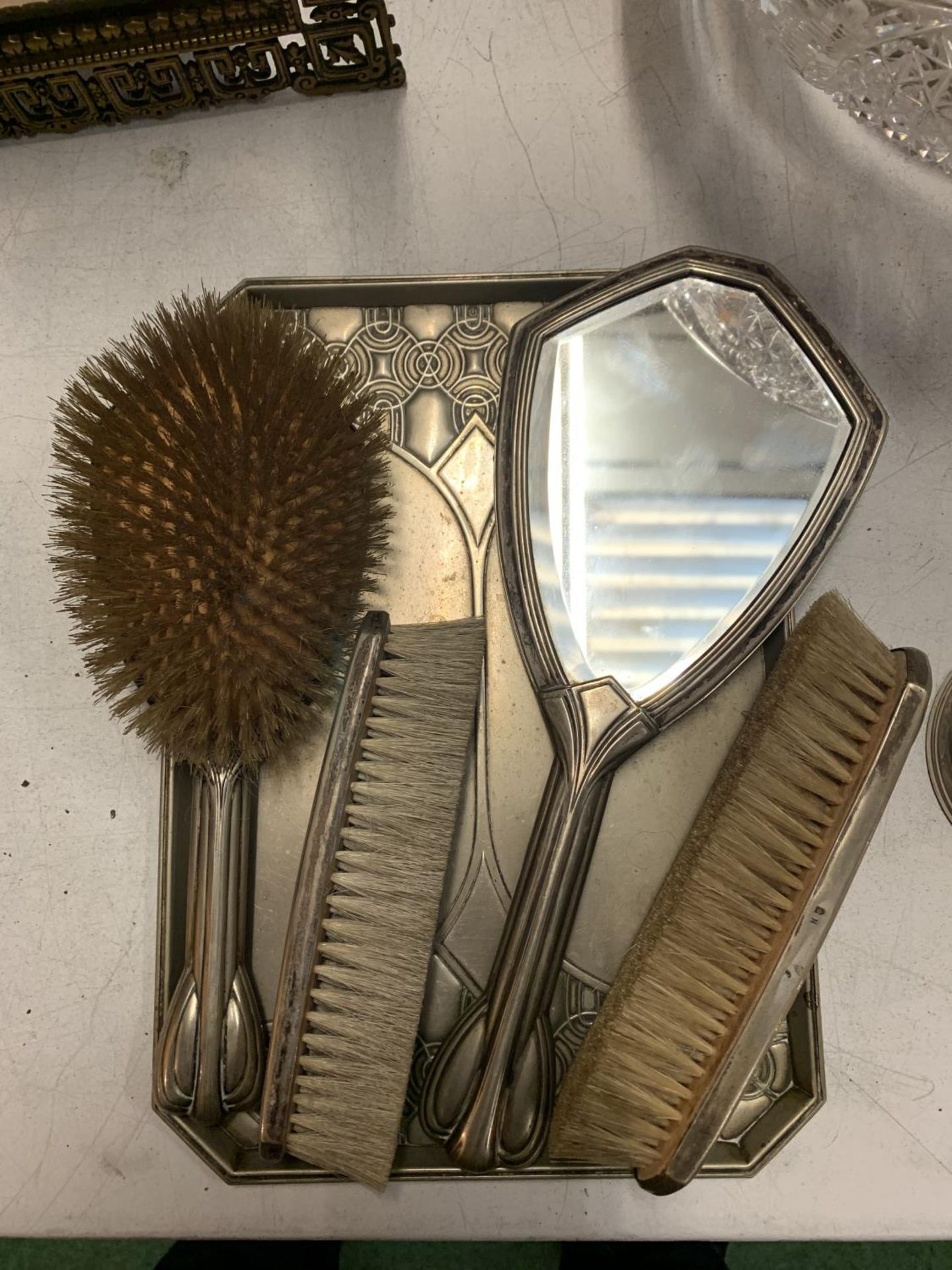 A WMF ART DECO DRESSING TABLE SET COMPRISING OF A TRAY. A HAIRBRUSH, TWO FURTHER BRUSHES AND A - Image 2 of 2