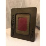 AN ART NOUVEAU WOODEN PHOTO FRAME. SIZE 25CM X 31CM