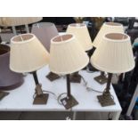 SIX MATCHING BRASS TABLE LAMPS WITH SHADES
