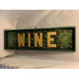 A WOODEN HAND PAINTED WINE SIGN 102CM X 30CM