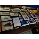 A LARGE QUANTITY OF FRAMED PRINTS RELATING TO BUSSES AND TRAINS