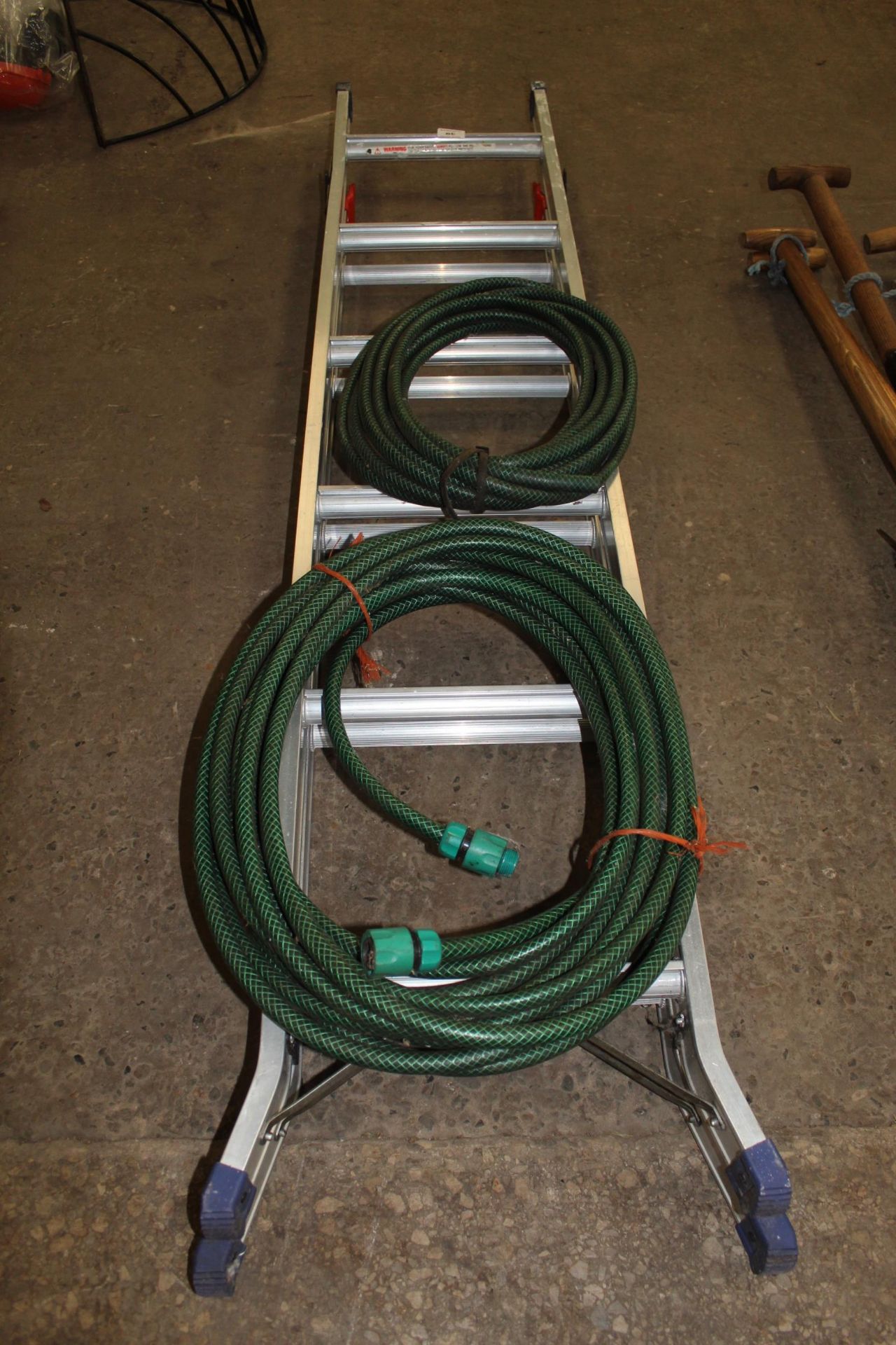 A THREE WAY STEP LADDER AND TWO HOSE PIPES NO VAT - Image 2 of 2
