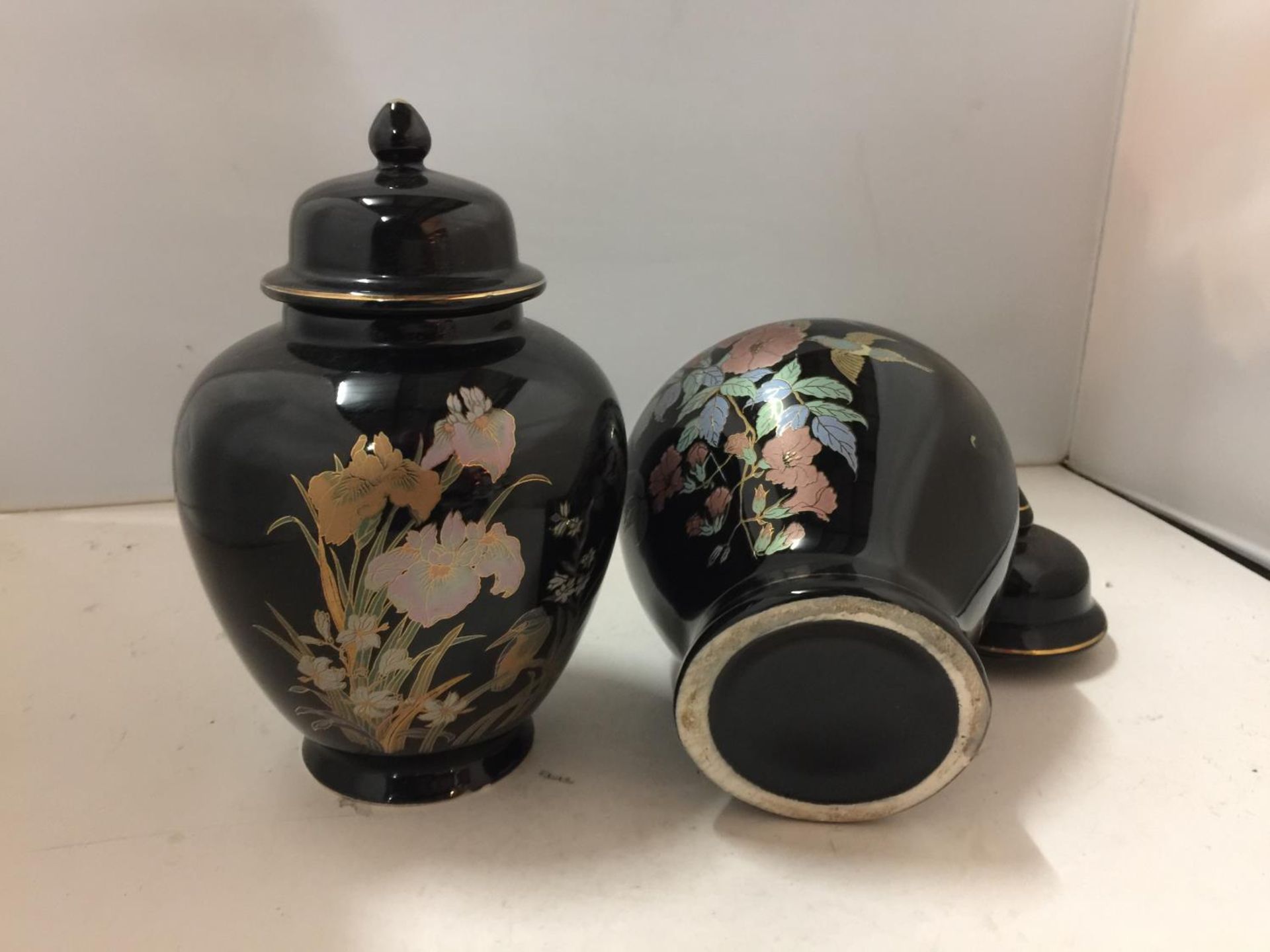 TWO BLACK GLAZED LIDDED STORAGE JARS WITH KINGFISHER AND FLORAL DESIGNS - Image 2 of 3