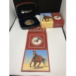 A BOXED SILVER 2014 1OZ AUSTRALIAN ONE DOLLAR WITH COLOURED HORSE DECORATION WITH CERTIFICATE OF