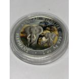 A SILVER 2014 1OZ AFRICAN SOMALI REPUBLIC 100 SHILLINGS COIN WITH AFRICAN ELEPHANT DECORATION